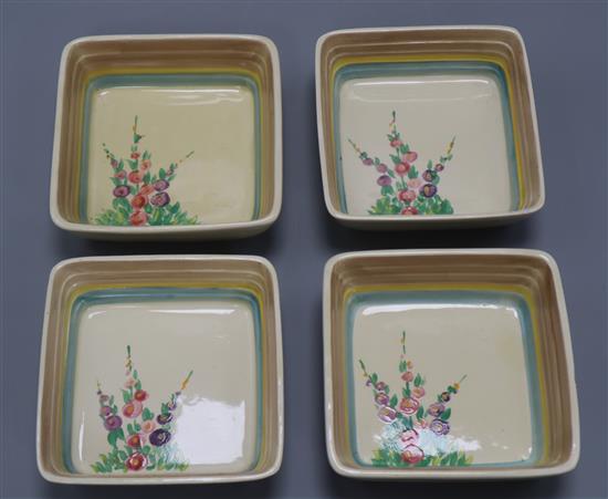 Four Clarice Cliff Hollyhock dishes length 11cm approx.